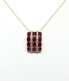 Ruby with Diamond Pendant Set in 18 Karat Gold Settings