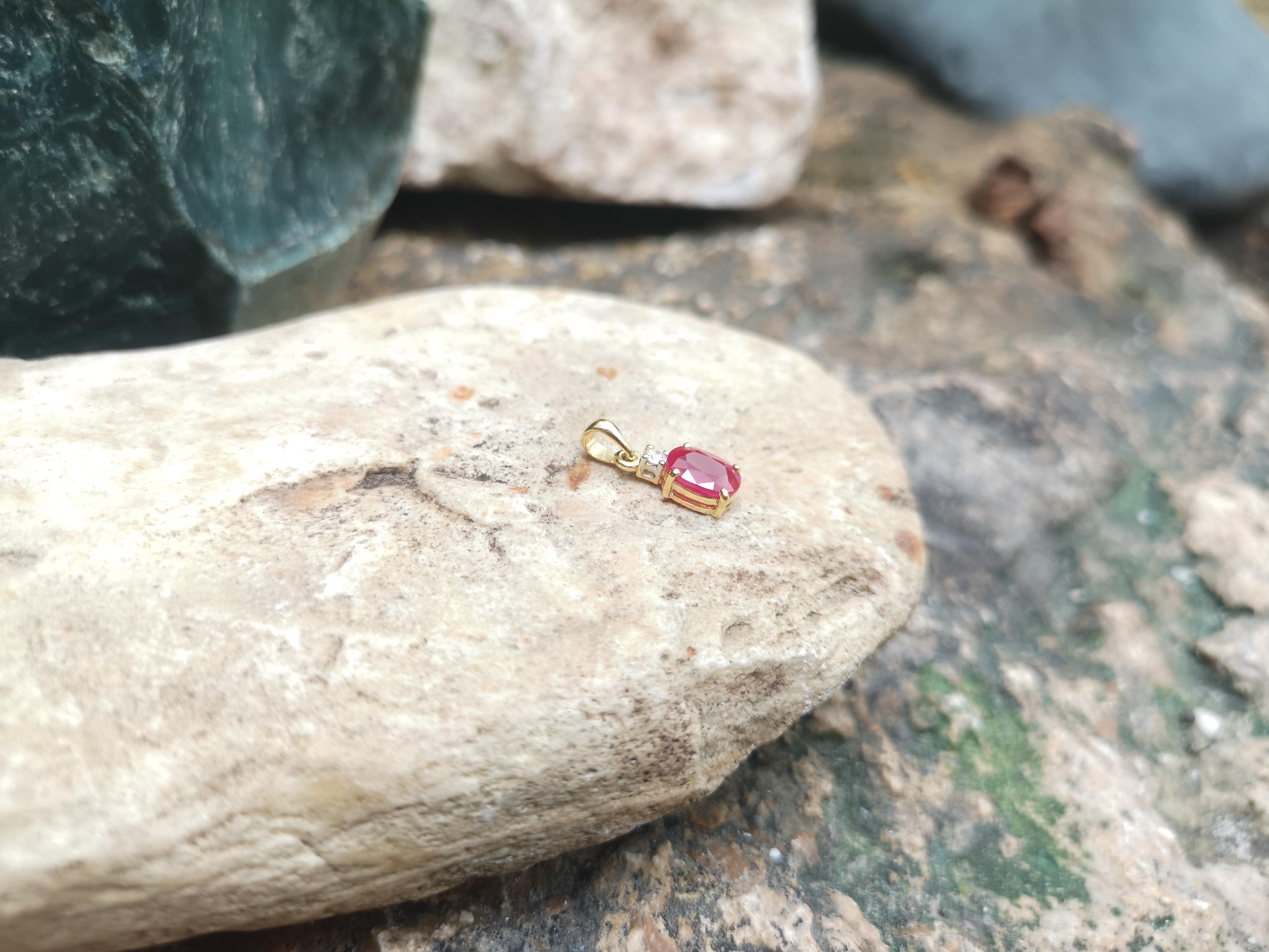 Oval Cut Ruby with Diamond Pendant Set in 18 Karat Gold Settings