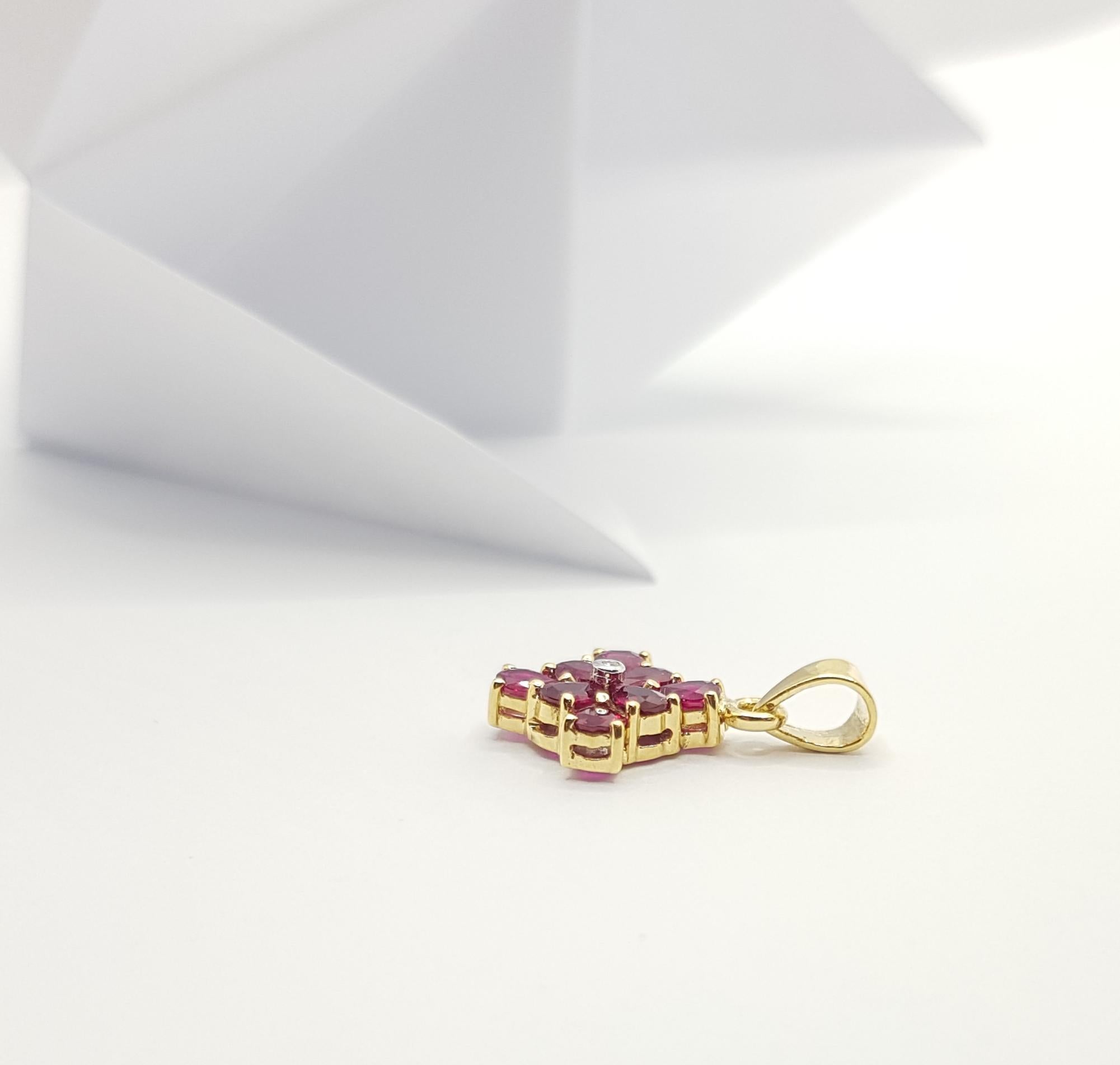 Oval Cut Ruby with Diamond Pendant Set in 18 Karat Gold Settings