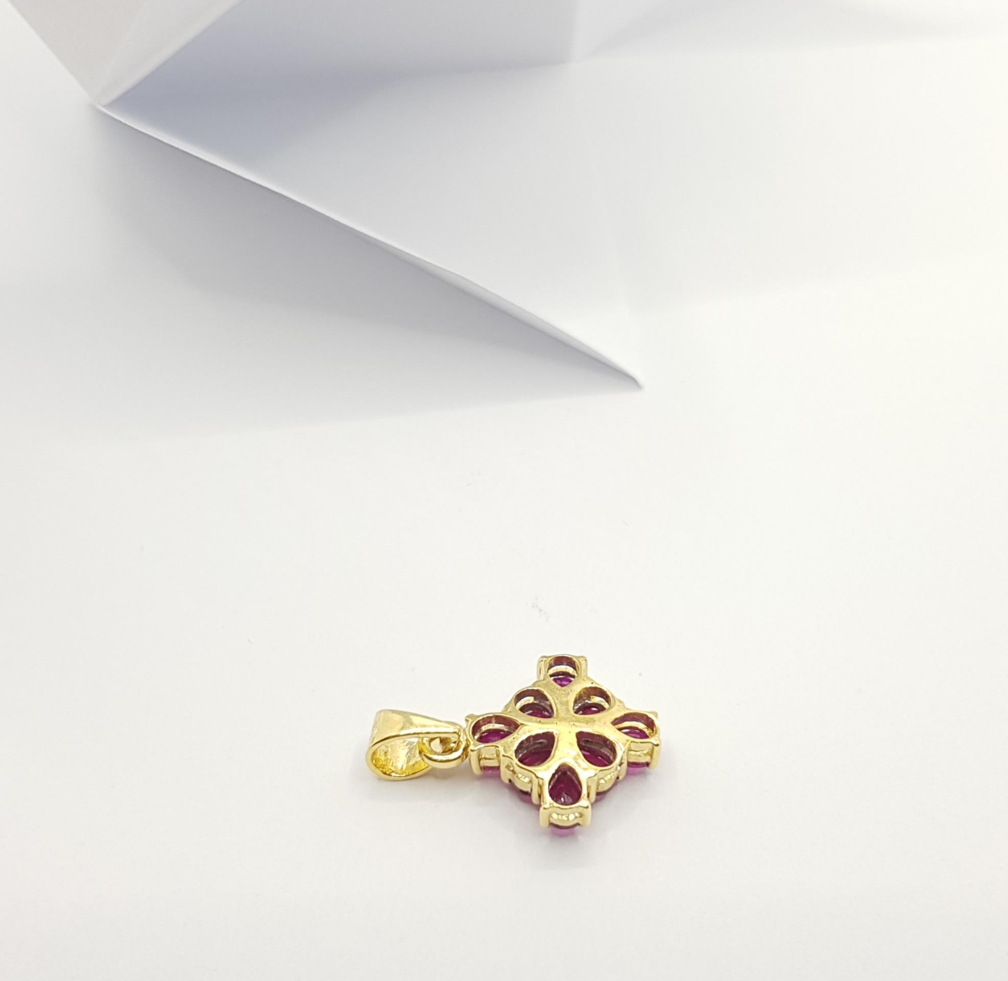 Women's Ruby with Diamond Pendant Set in 18 Karat Gold Settings