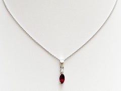 Ruby with Diamond Pendant Set in 18 Karat White Gold Settings