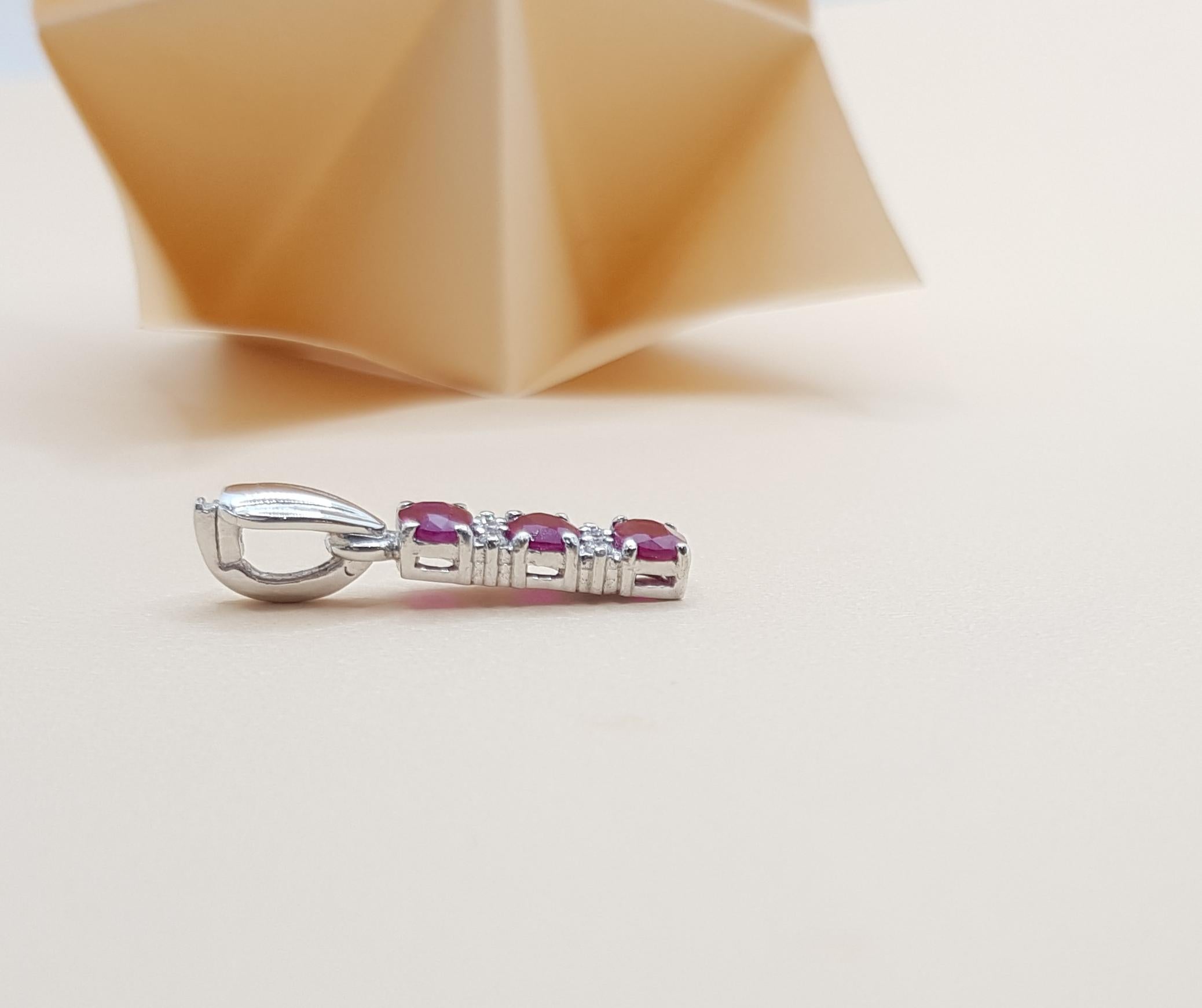 Women's Ruby with Diamond Pendant Set in 18 Karat White Gold Settings For Sale