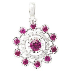 Ciondolo con rubino e diamante incastonato in oro bianco 18 carati
