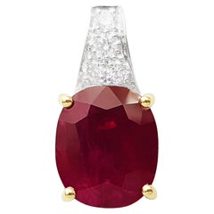 Ciondolo con rubino e diamante incastonato in oro bianco/giallo 18 carati