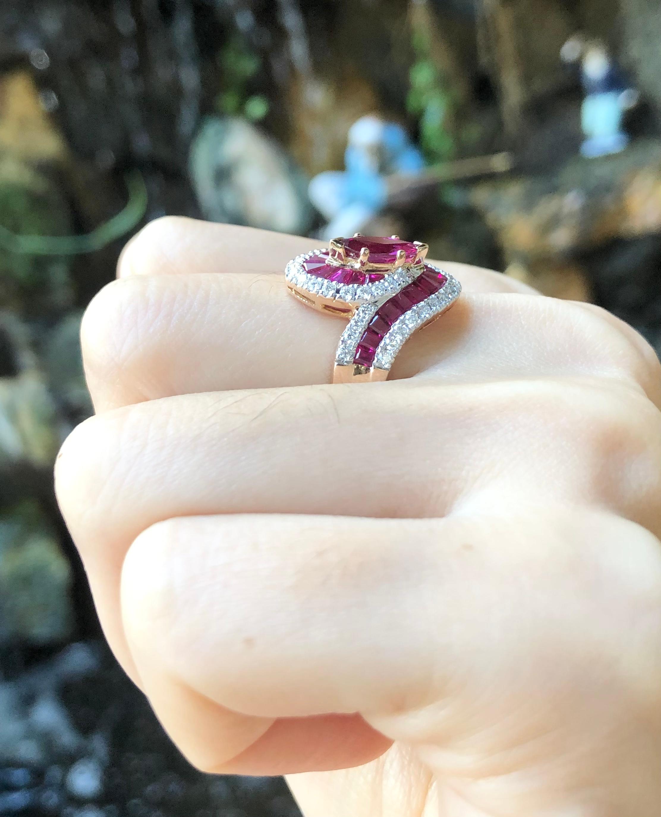 Ruby 0.79 carat with Ruby 2.58 carats and Diamond 0.51 carat Ring set 18 Karat Rose Gold Settings

Width:  1.2 cm 
Length: 1.9 cm
Ring Size: 51
Total Weight: 7.59 grams


