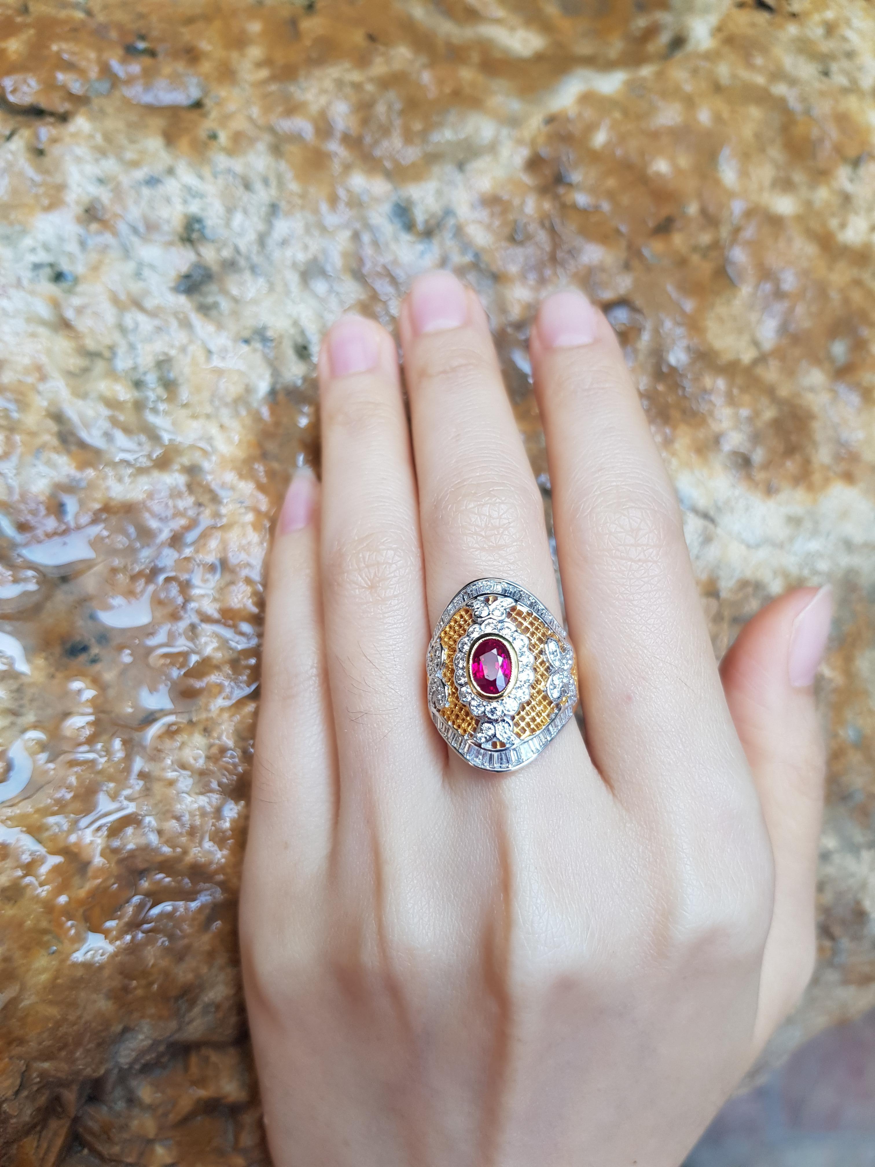 Ruby 1.04 carats with Diamond 0.81 carat Ring set in 18 Karat Gold Settings

Width:  1.8 cm 
Length: 2.5 cm
Ring Size: 53
Total Weight: 7.78 grams

