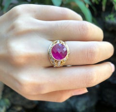 Ruby with Diamond Ring Set in 18 Karat Gold Settings