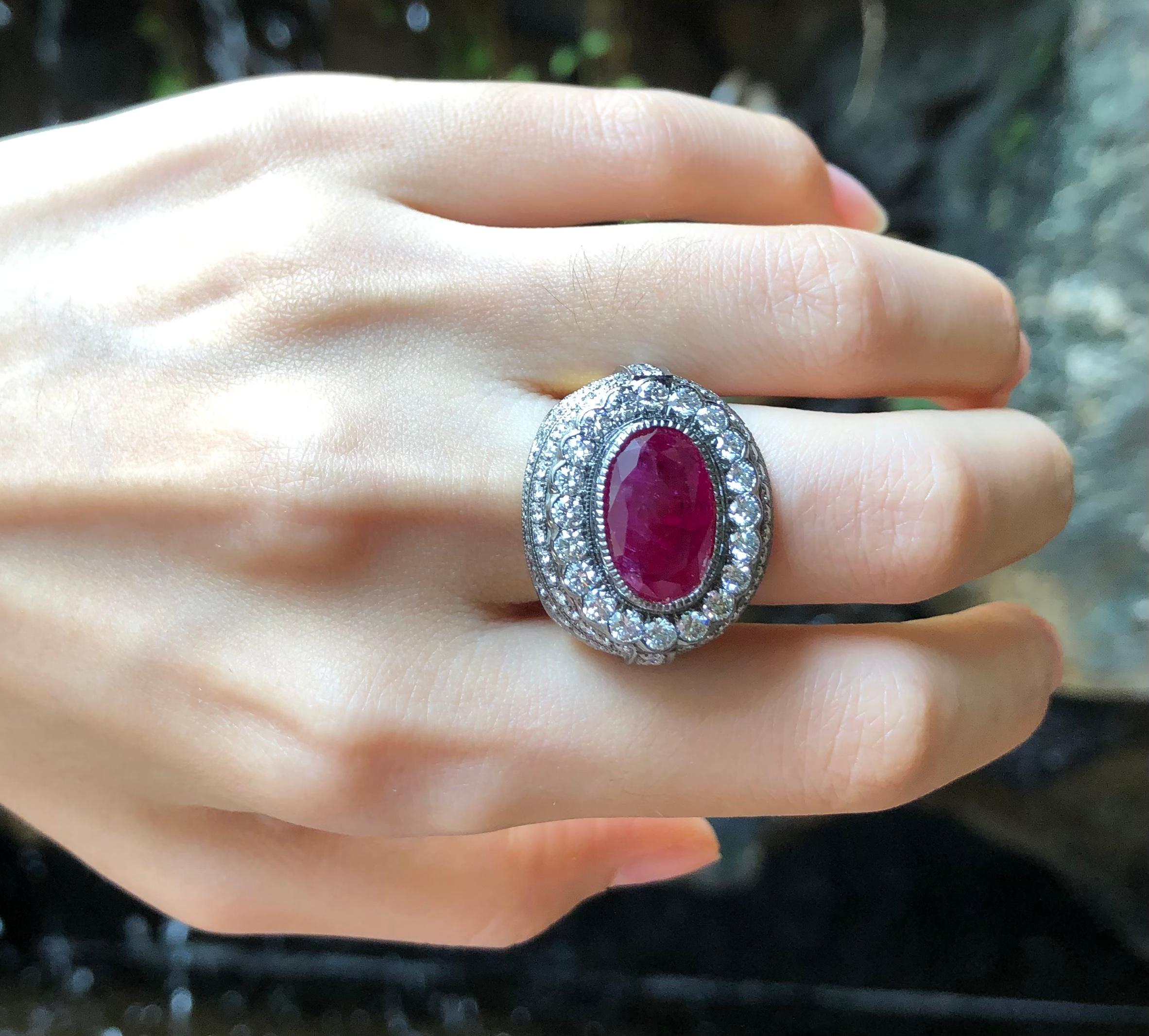 Ruby 5.57 carats with Diamond 2.96 carats Ring set in 18 Karat Gold Settings

Width:  2.3 cm 
Length:  2.1 cm
Ring Size: 59
Total Weight: 16.13 grams

Ruby
Width:  1.5 cm 
Length:  1.0 cm

