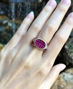 Bague en or 18 carats sertie d'un rubis et de diamants