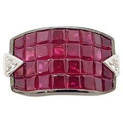 Bague en or 18 carats sertie d'un rubis et de diamants