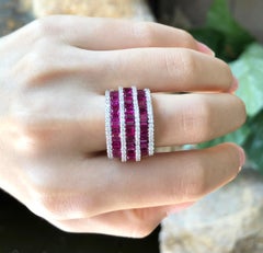 Bague en or rose 18 carats sertie de rubis et de diamants
