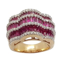 Anello con rubino e diamante incastonato in oro rosa 18 carati