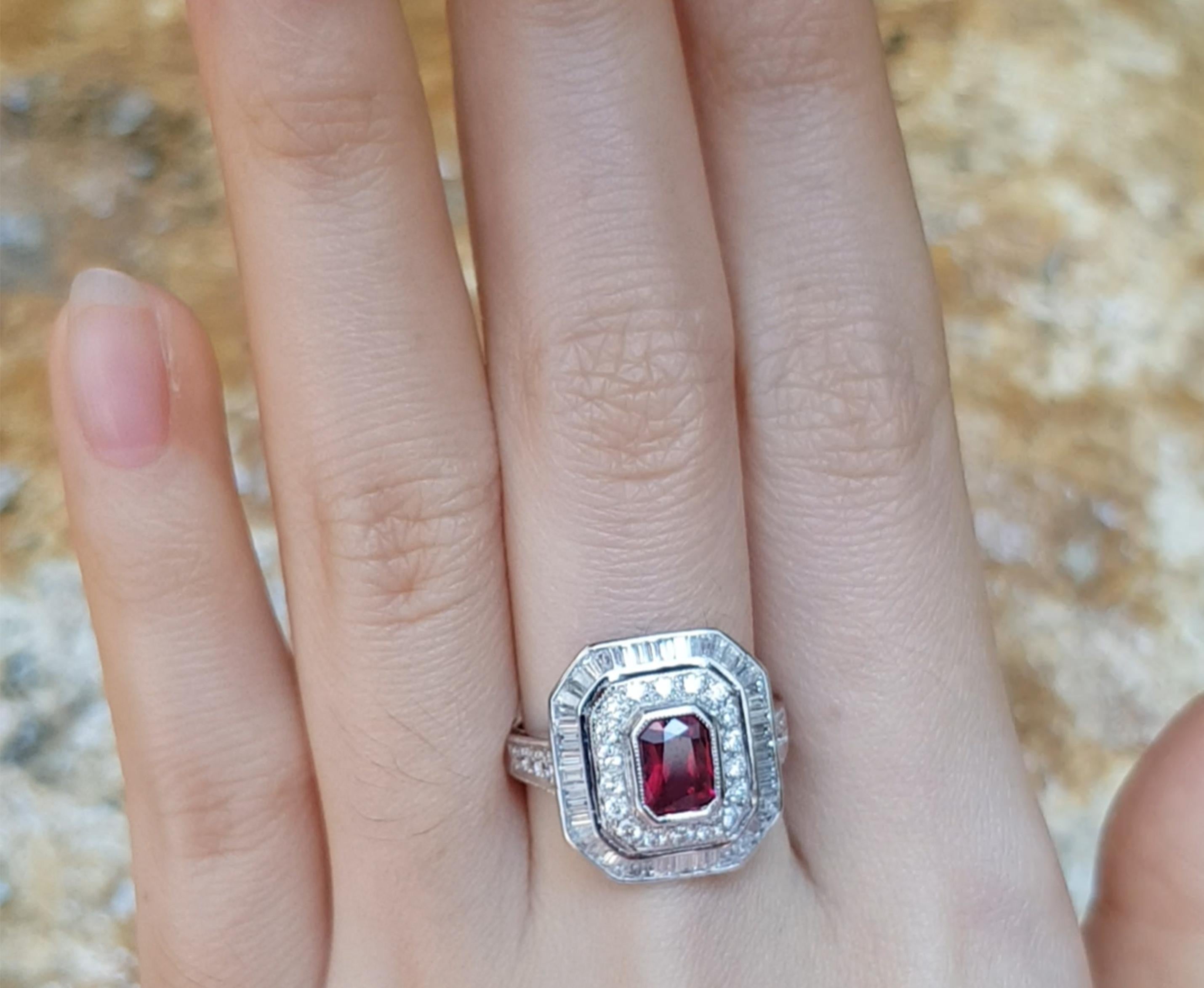 Ruby 0.85 carat with Diamond 0.54 carat Ring set in 18 Karat White Gold Settings

Width:  1.5 cm 
Length: 1.7 cm
Ring Size: 54
Total Weight: 5.51 grams


