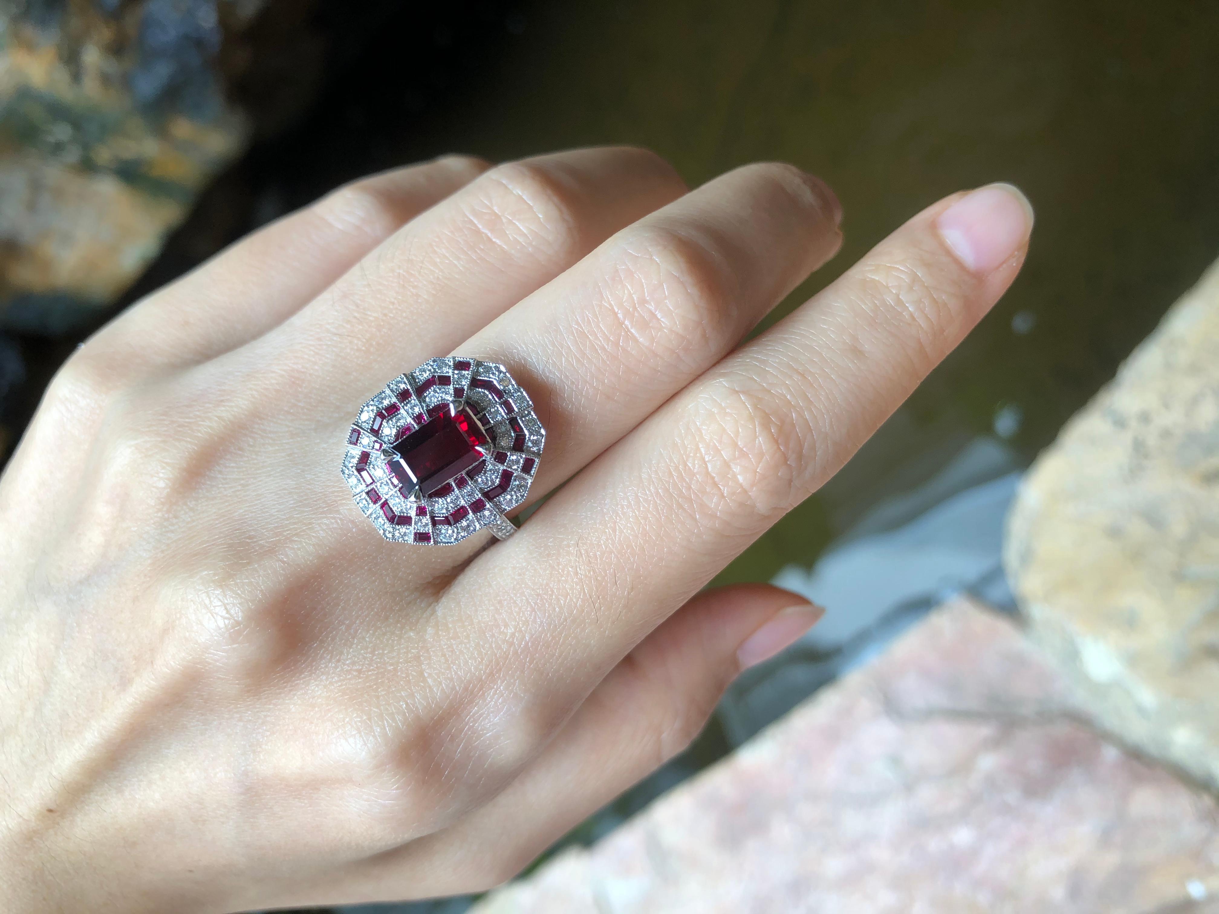 Ruby 2.02 carats with Ruby 1.18 carats and Diamond 0.49 carat Ring set in 18 Karat White Gold Settings

Width:  0.6 cm 
Length: 0.9 cm
Ring Size: 53
Total Weight: 8.14 grams

