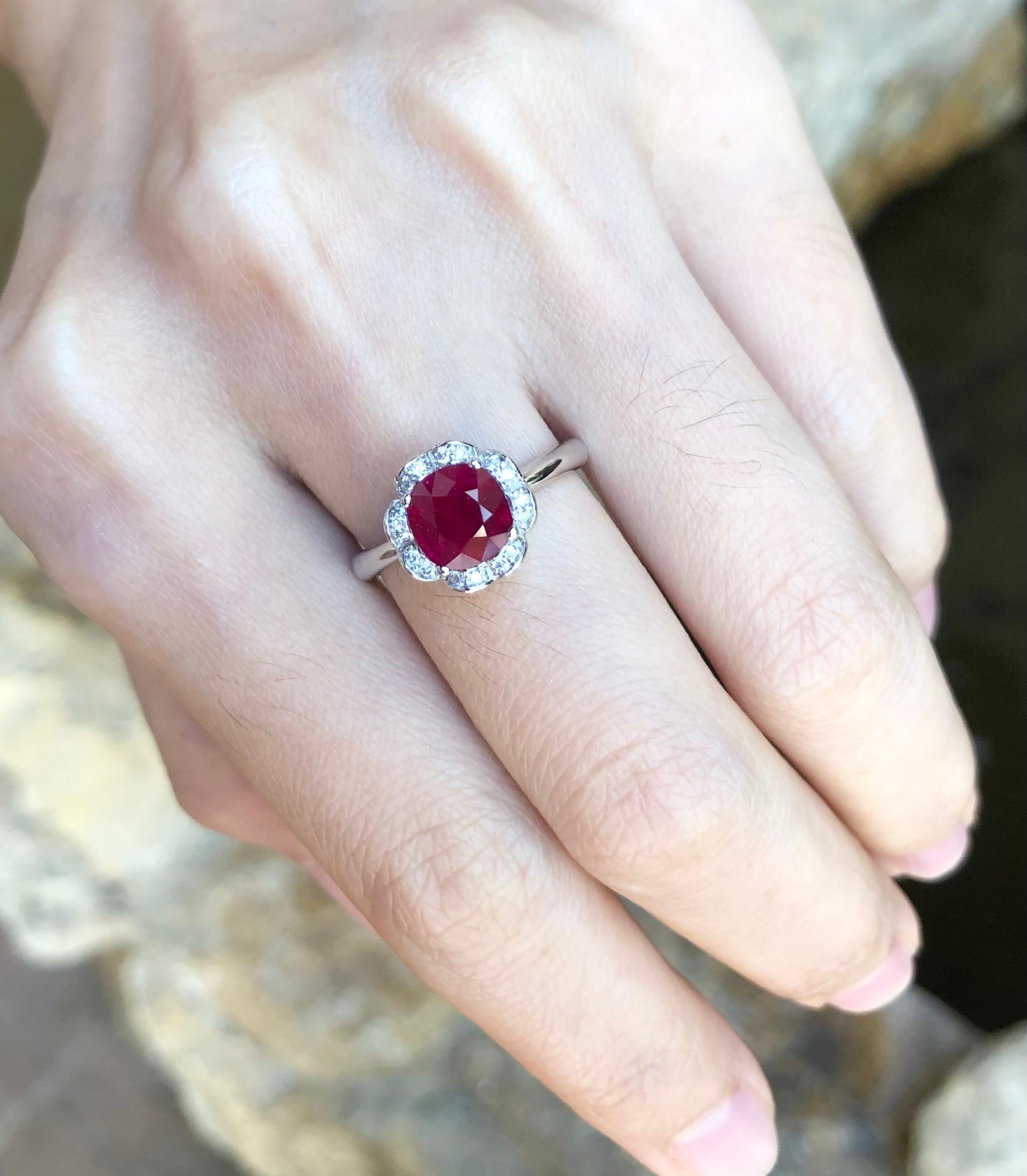 Ruby 2.01 carats with Diamond 0.09 carat Ring set in 18 Karat White Gold Settings

Width:  1.0 cm 
Length:  1.0 cm
Ring Size: 51
Total Weight: 4.45 grams

