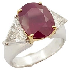 Bague en or blanc 18 carats ornée de rubis et de diamants