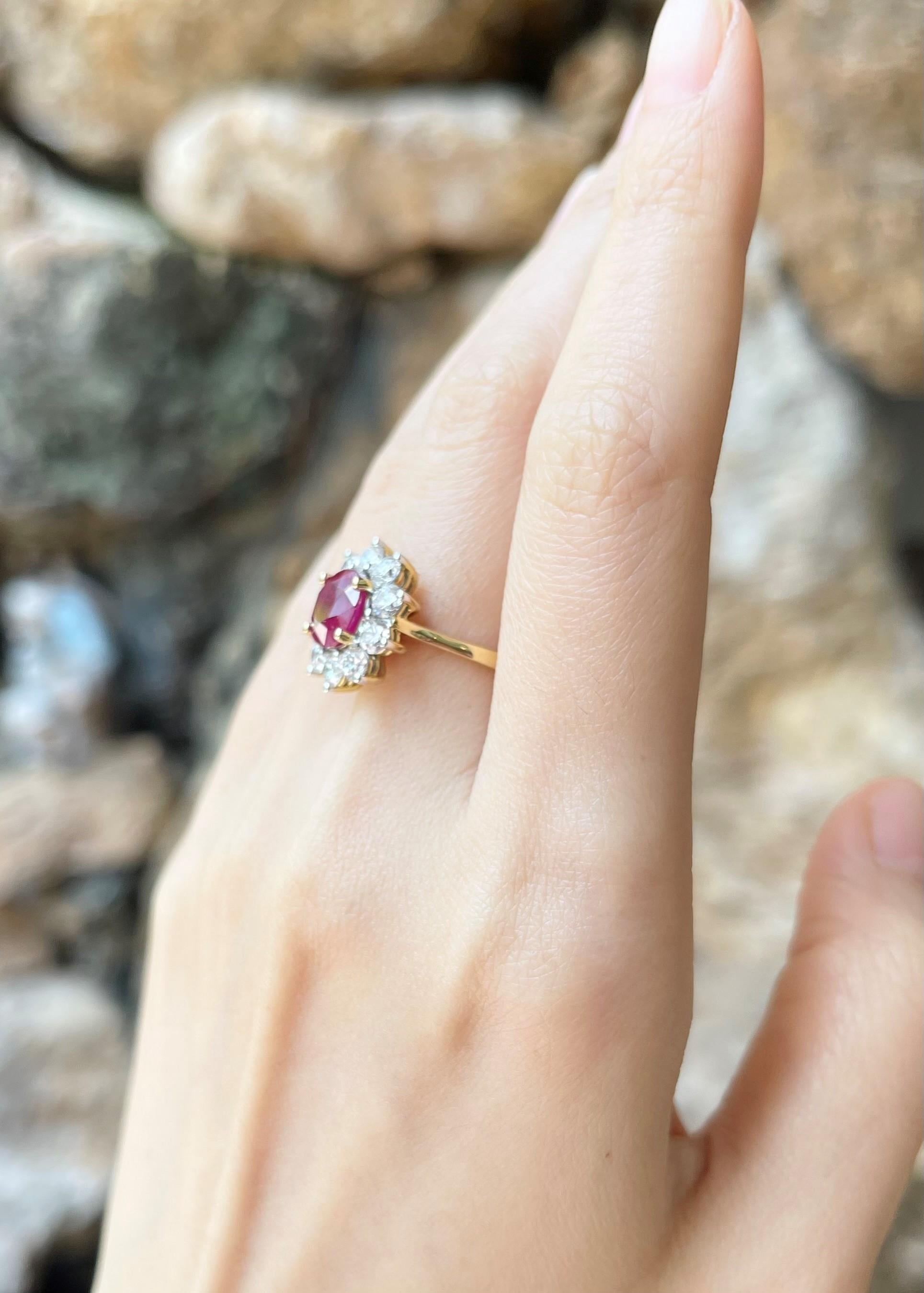 Ruby 2.41 carats with Diamond 1.41 carats Ring set in 18K Gold Settings

Width:  1.4 cm 
Length: 1.5 cm
Ring Size: 53
Total Weight: 5.84 grams

