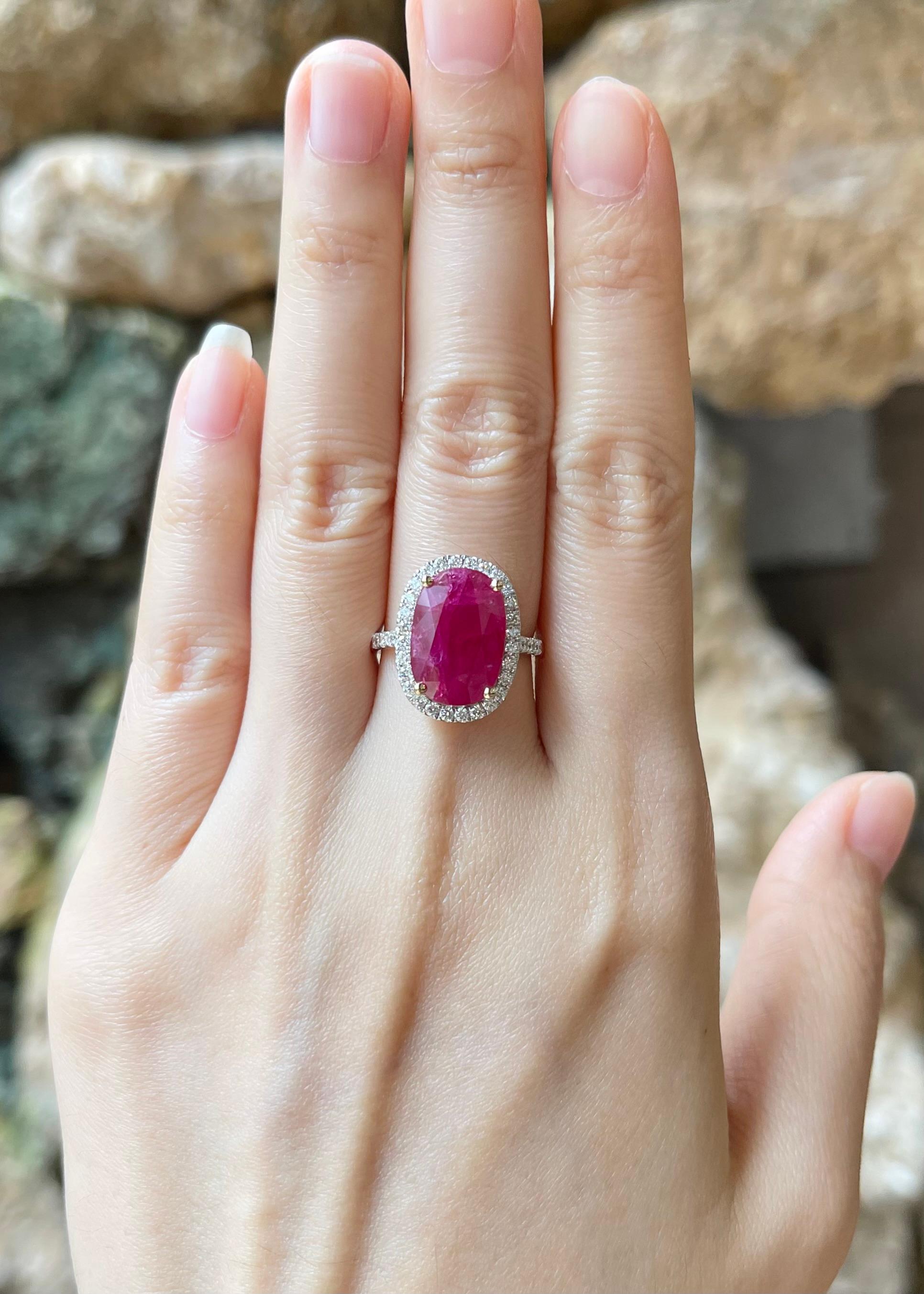 Ruby 4.82 carats with Diamond 0.52 carat Ring set in 18K Gold Settings

Width:  1.3 cm 
Length: 1.8 cm
Ring Size: 53
Total Weight: 5.54 grams

