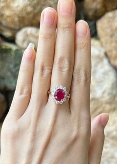 Ruby with Diamond Ring set in 18K Gold Settings