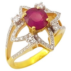 Bague en or 18 carats sertie de rubis et de diamants