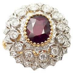 Ruby with Diamond Ring set in 18K Gold Settings