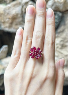 Anello con rubino e diamante con montatura in oro rosa 18K