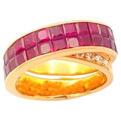 Bague en or rose 18 carats sertie de rubis et de diamants