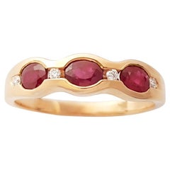 Anello con rubino e diamante con montatura in oro rosa 18K