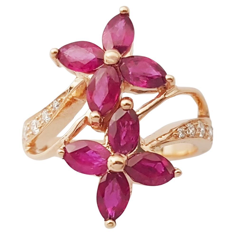Anello con rubino e diamante con montatura in oro rosa 18K