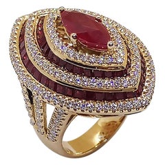 Bague en or rose 18 carats sertie d'un rubis, de rubis et de diamants