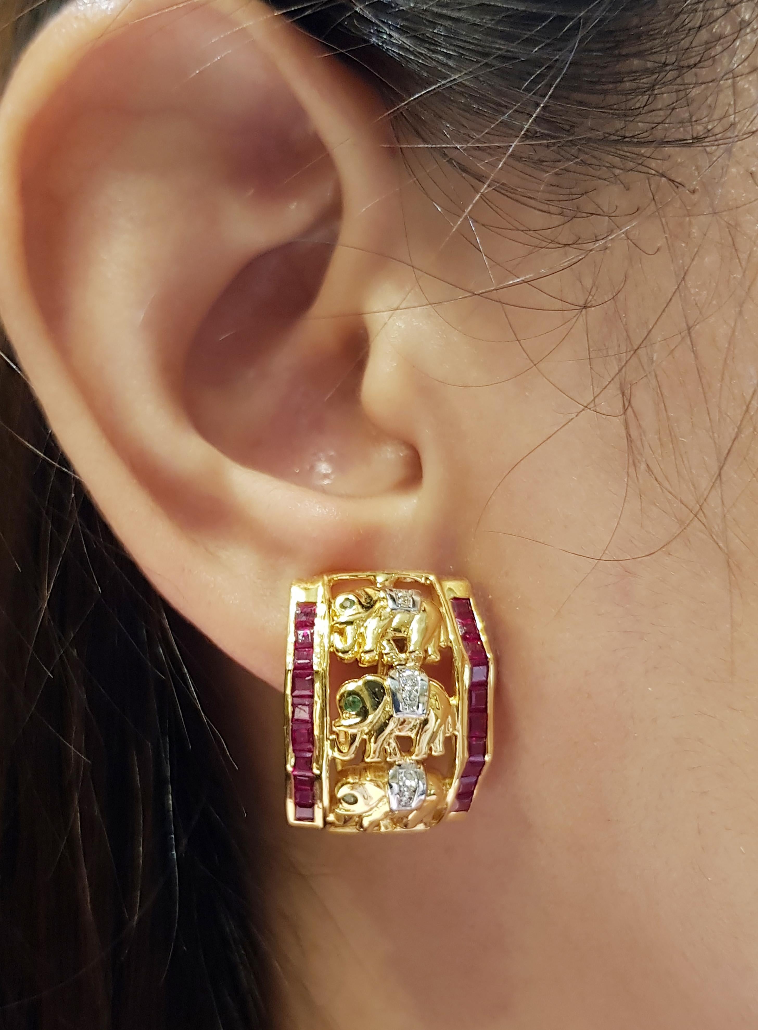 Ruby 2.66 carats with Tsavorite 0.12 carat and Diamond 0.21 carat Elephant Earrings set in 18 Karat Gold Settings

Width:  1.6 cm 
Length: 2.2 cm
Total Weight: 17.25 grams

