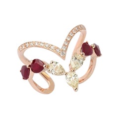 Bague en or jaune 18 carats avec rubis et diamants jaunes
