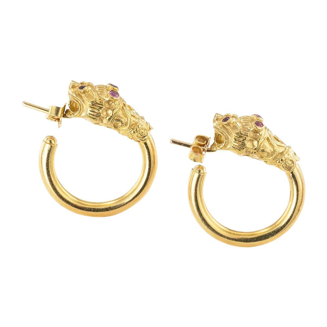Estate ruby and yellow gold lion head hoop earrings circa 1960.  Clear and concise information you want to know is listed below.  Contact us right away if you have additional questions.  We are here to connect you with beautiful and affordable