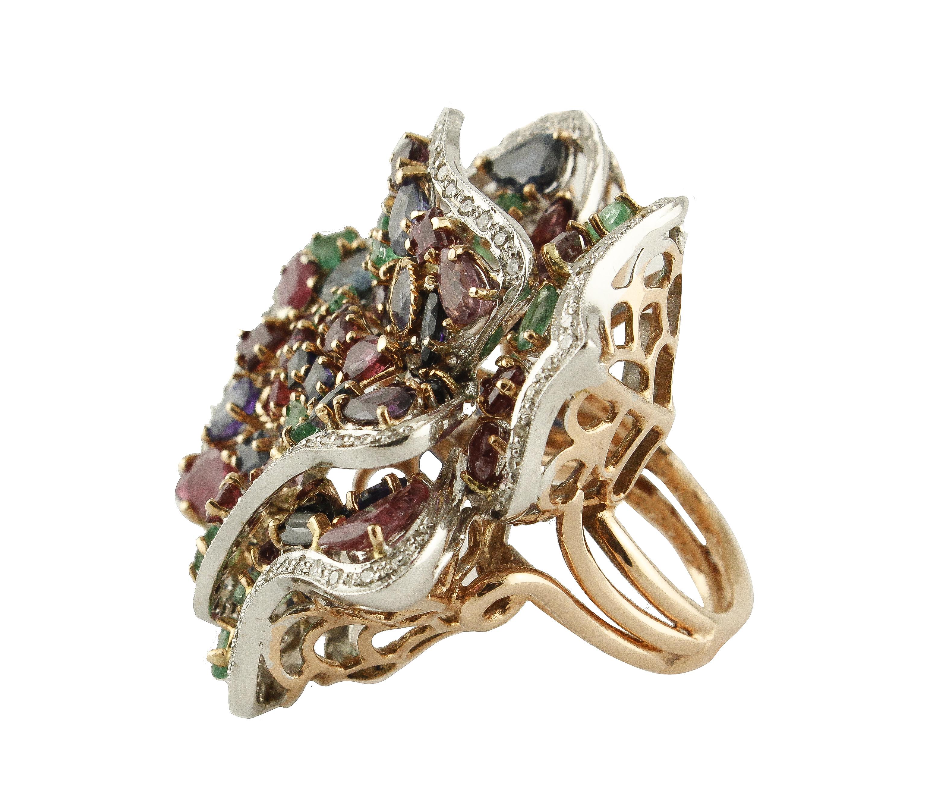 Amazing ring in 14 kt rose gold, it is a rose 4 cm long, 3.3 cm wide, with petals all enriched with sapphires, rubies and emeralds from ct 19.18 and a frame of 0.77 ct diamonds. Total weight g 29.06
Sapphires - Rubibi - Emeralds ct 19.18 / 4 cm