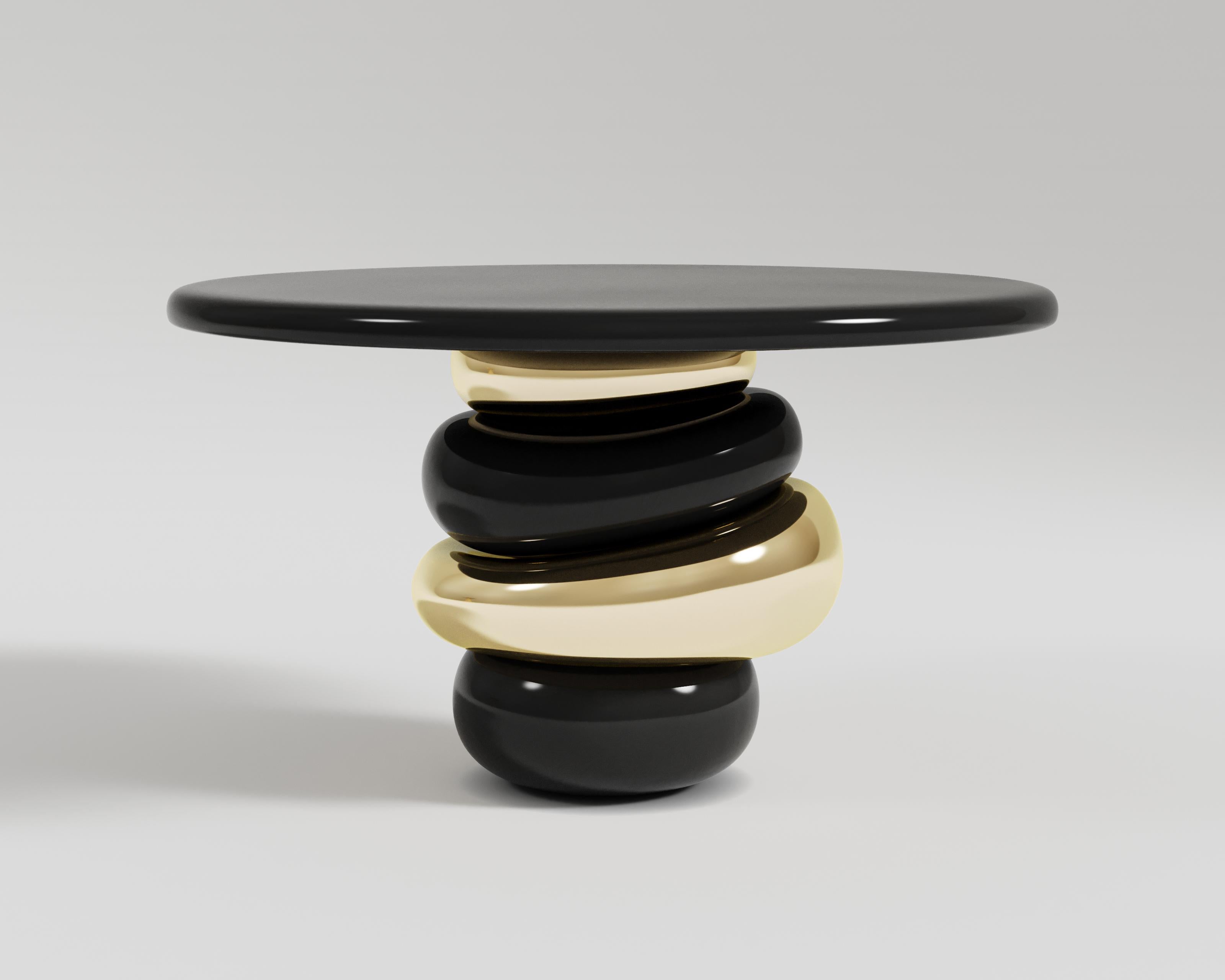 Ruche Console Black Lacquer
Ruche is a ballet of disparate elements that goes beyond the duties of being functional and turns out to be a mesmerizing art. The frame is constructed entirely from metal, one can easily visualize the toughness and