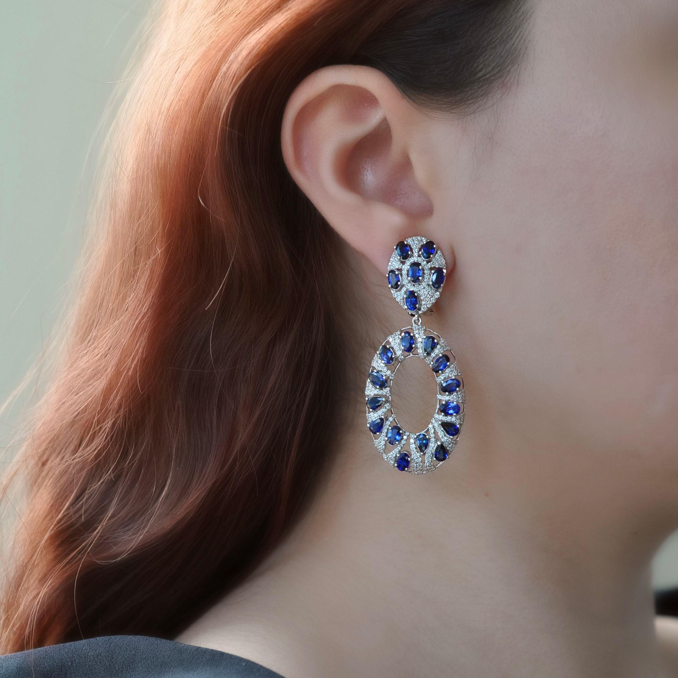 Contemporary RUCHI Brilliant Cut Diamond and Oval Blue Sapphire White Gold Dangle Earrings For Sale
