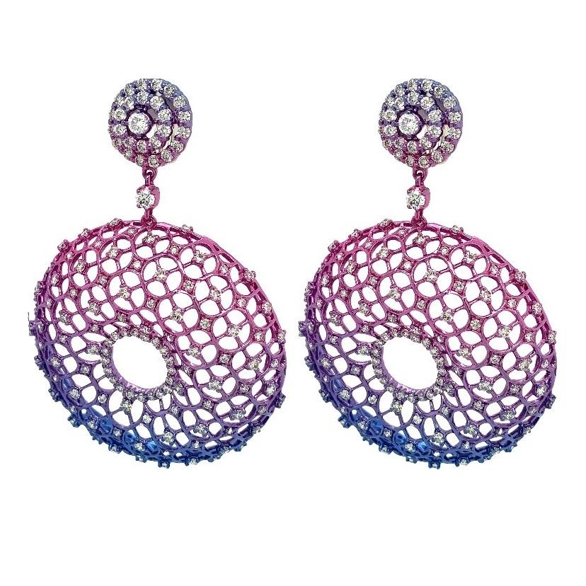 Featuring a total of 5.16 carats of brilliant-cut diamonds, these 18k gold chandelier earrings with multi-colored tinted rhodium and clip-on post closures showcase a web-like circular design, creating a lightweight yet eye-catching effect.

18K