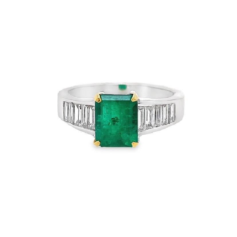 Featuring a 1.36-carat Colombian emerald with baguette diamond detailing on the white gold shank and a yellow gold prong setting, this cocktail ring can double as a statement or engagement ring.

18K White Gold
Emerald - 1.36 Ct
Diamond - 0.85