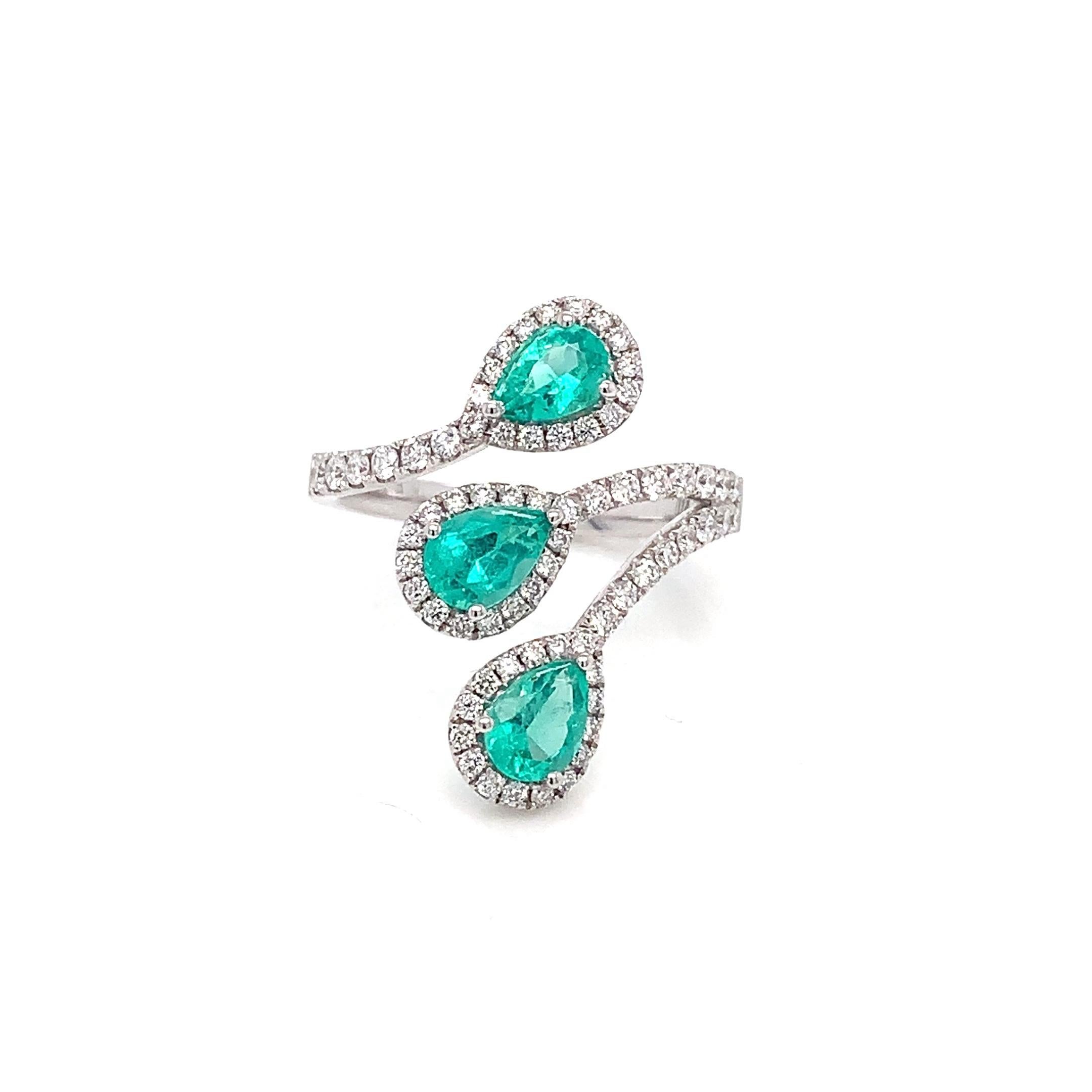 Contemporary RUCHI Emerald with Diamond Halo White Gold Bypass Ring For Sale