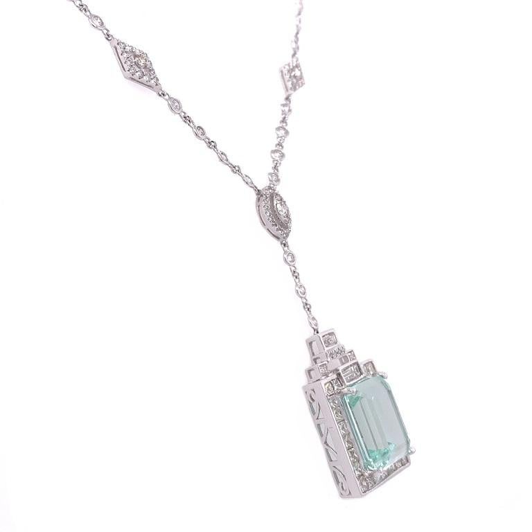 Exclusive Collection

Art Deco inspired necklace featuring an emerald cut Aquamarine with round and step cut Diamonds. Set in 18K white gold. 

Aquamarine: 7.18ct total weight.
Diamonds: 1.99ct total weight. 
All diamonds are G-H/SI stones.
