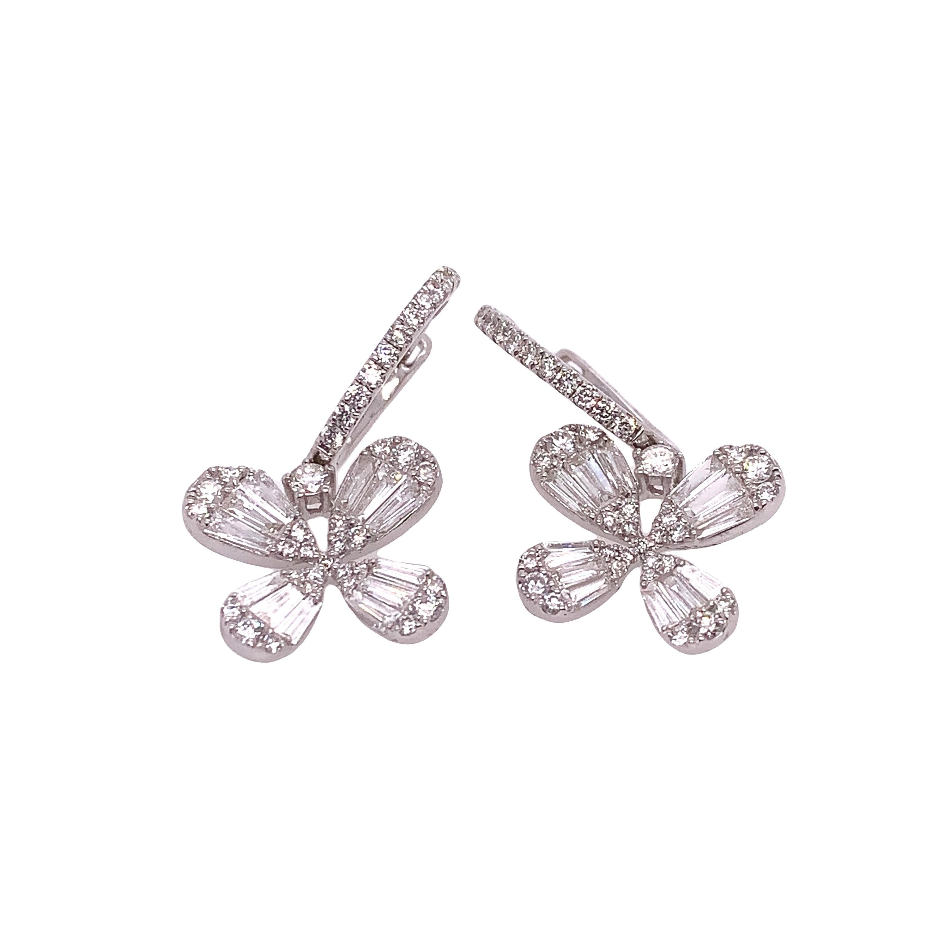 Baguette Collection

Delicately handcrafted, this pair of earrings features total 1.34 carat white diamonds set in an 18K white gold. A butterfly design drop down from tiny huggees giving the earrings a unique look.

Diamond: 1.34ct total weight
All