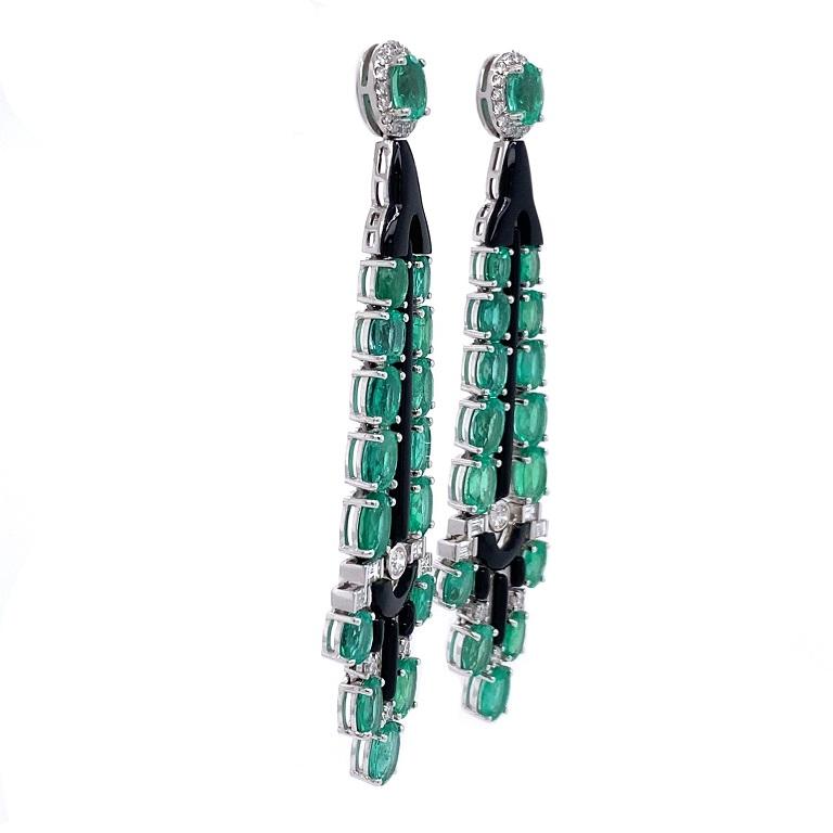 Black Velvet Collection 

Strongly influenced by art deco, these striking earrings feature bright green Emeralds and multi shape Diamonds with custom cut black Agate. Set in 18K white gold. 

Emeralds: 12.73ct total weight.
Black Agate:4.40ct total