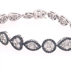 RUCHI Bracelet tennis illusion en or blanc avec diamants noirs et blancs