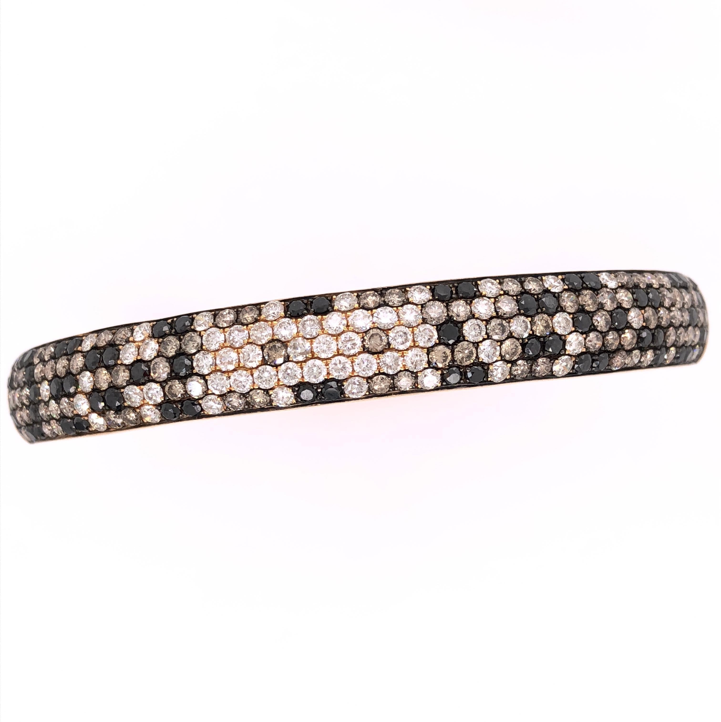 18K Rose Gold
Brown Diamonds: 2.81ct total weight.
Black Diamonds: 1.72ct total weight.
Diamonds: 1.51ct total weight.
All diamonds are G-H/SI stones.
Width - is approximately 1cm/0.40inches.