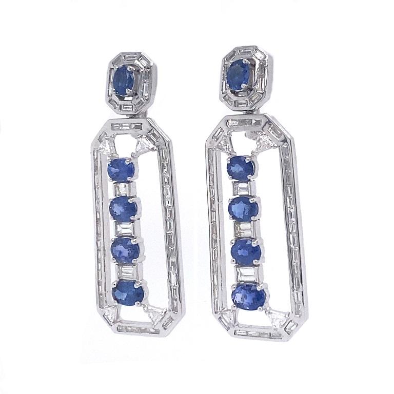 Midnight Collection 

Strongly Art Deco inspired blue Sapphire and Diamond drop earrings. Set in 18K white gold. 

Blue Sapphires: 4.89ct total weight.
Diamonds: 2.94ct total weight.
All diamonds are G-H/SI stones.

