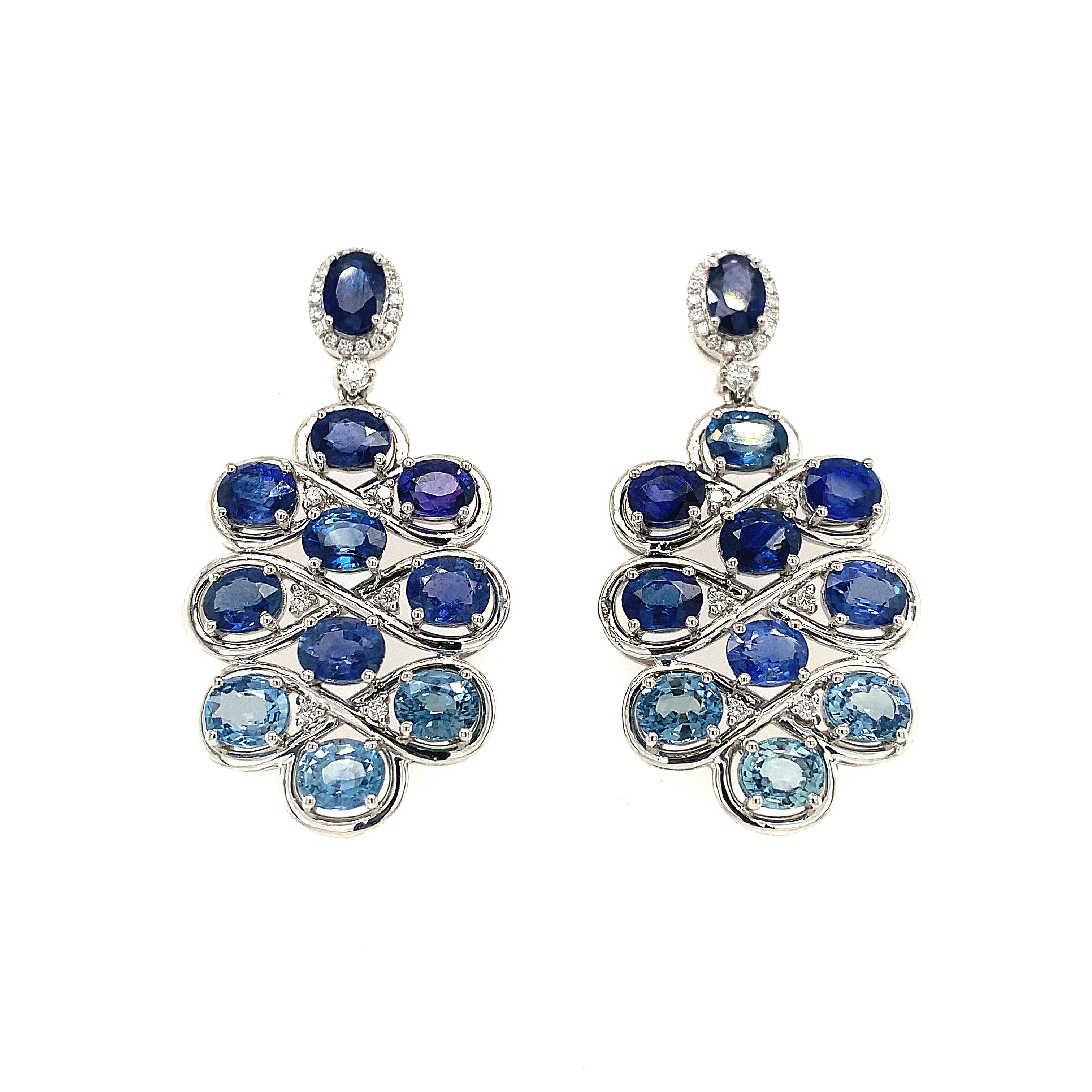 Ombre Collection
Blue Sapphire and Diamond  drop earrings  Set in 18K white gold. 

Blue Sapphire: 11.45ct total weight.
Diamonds: .30ct total weight.
All diamonds are G-H/SI stones.