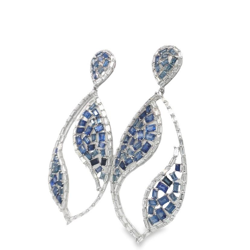 Or blanc 18K
Saphir bleu- 6.68 Cts
Diamants- 4.47 Cts
Tous les diamants sont de qualité G-H/SI