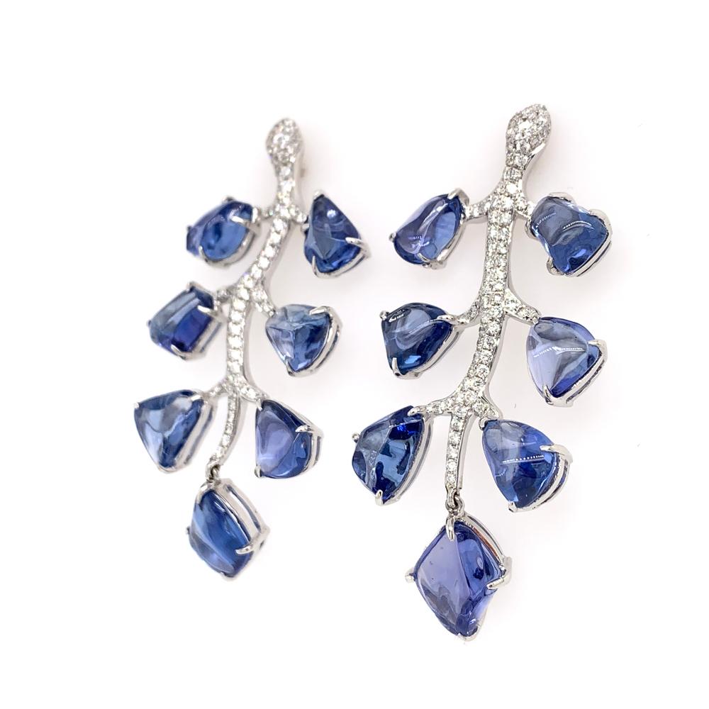 18K White Gold
Blue Sapphire: 21.88ctct total weight. 
Diamonds: 0.84ctct total weight. 
All diamonds are G-H/SI stones.