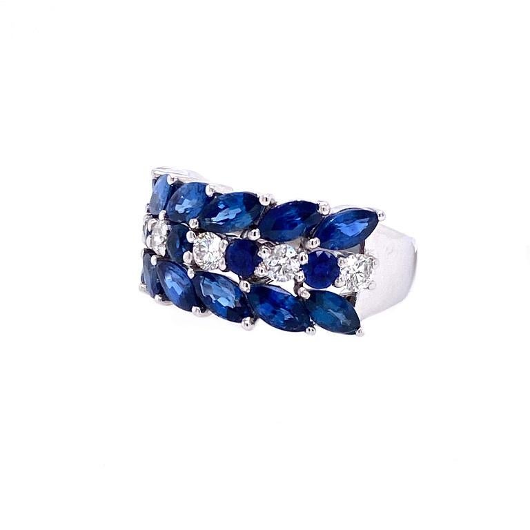 Skylight Collection 

Marquise and round blue Sapphire and Diamond band ring set in 18K white gold. US size 5. 

Blue Sapphires: 3.50ct total weight. 
Diamonds: 0.40ct total weight. 
All diamonds are G-H/SI stones.
