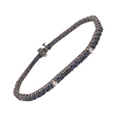 RUCHI Bracciale da tennis in rodio nero con zaffiro blu e diamanti